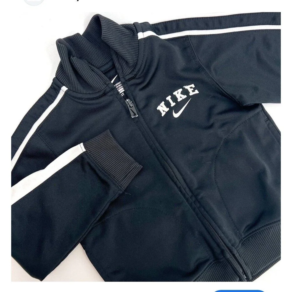 Nike NIKE Embroidered logo zip up track jacket New without Tags